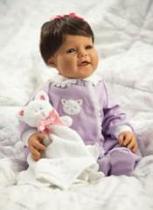She wears a lavender cotton knit romper trimmed with venice lace and accented with a soft kitty appliqu� on chest. Plush kitty blankie included